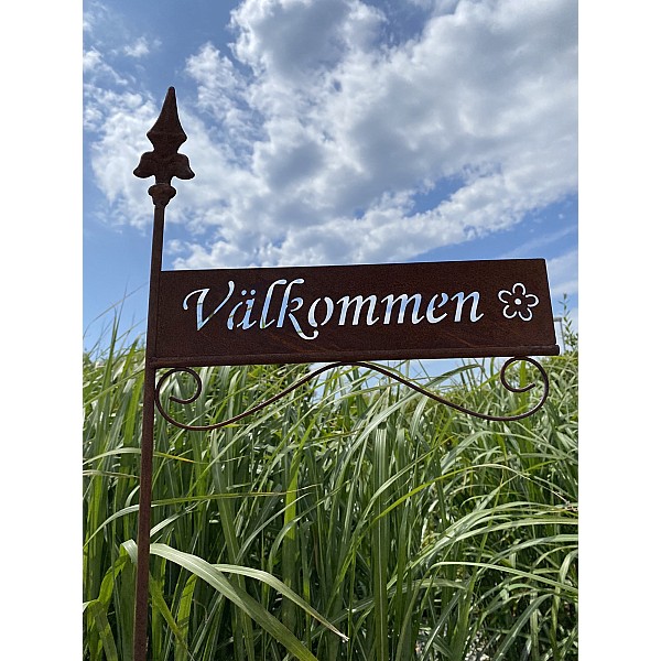 Schild Välkommen Fahne