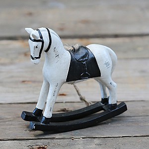 Gunghäst med svart sadel