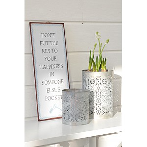 Plåtskylt The key to your happiness