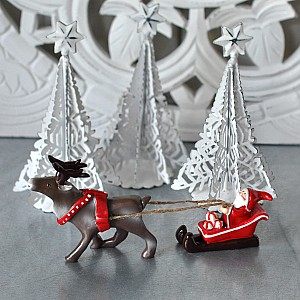 Tomtesson på släde