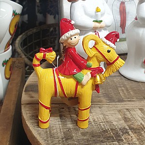 Santa auf einer Strohbock