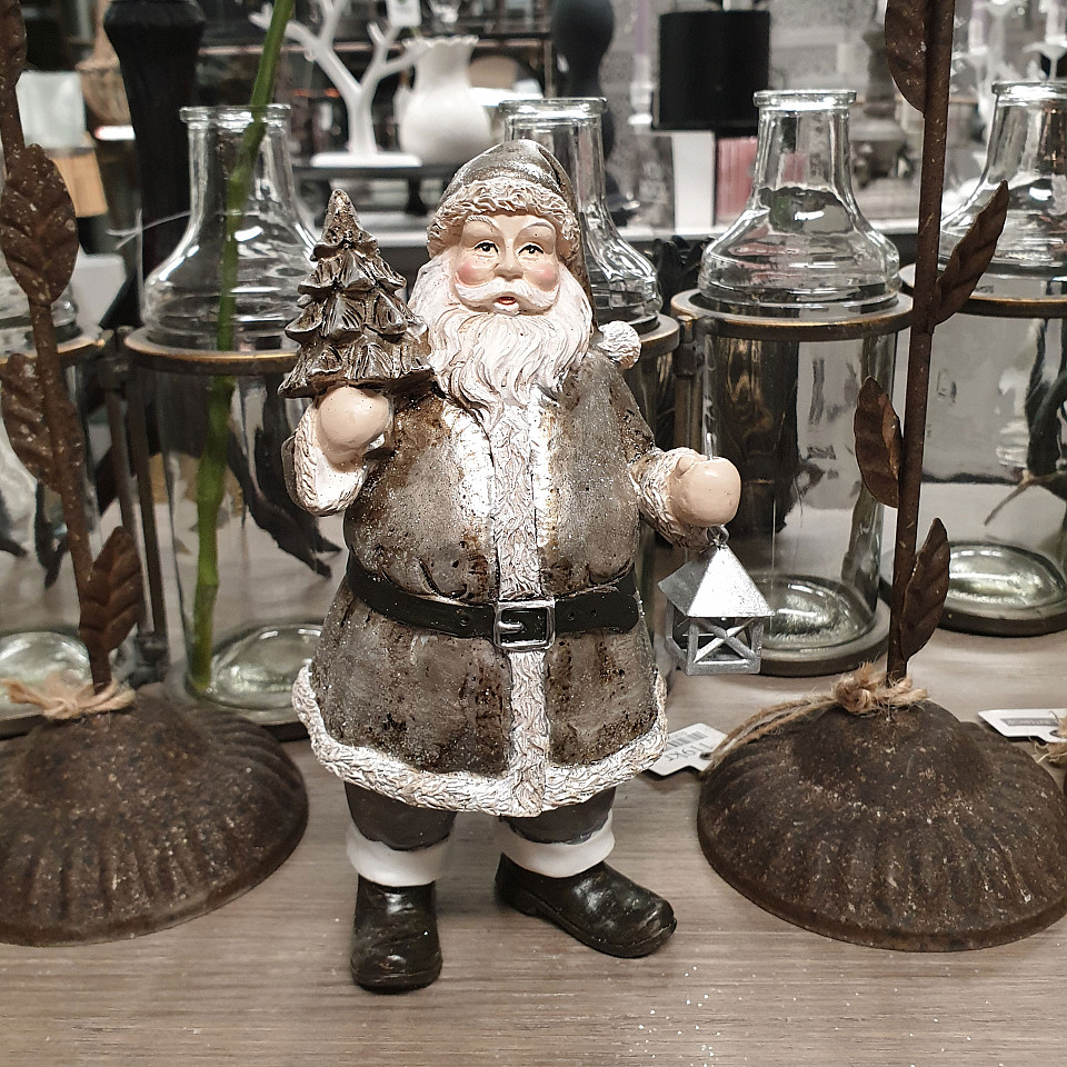 Santa with spruce and lantern